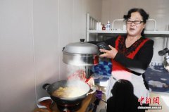 内蒙古土左旗灾后重建见闻：炉火正旺，新居灯明